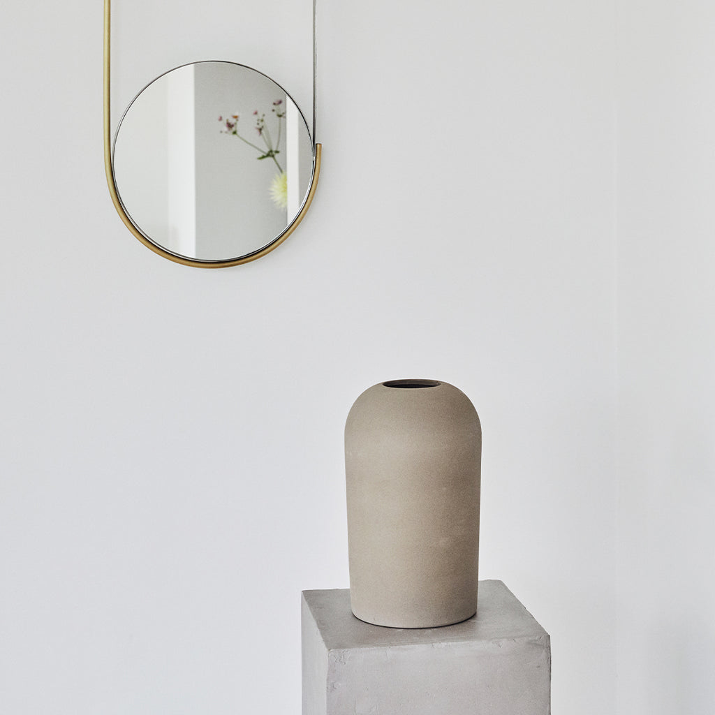 Kristina Dam's grey terracotta vase and Mobile mirror design from Denmark