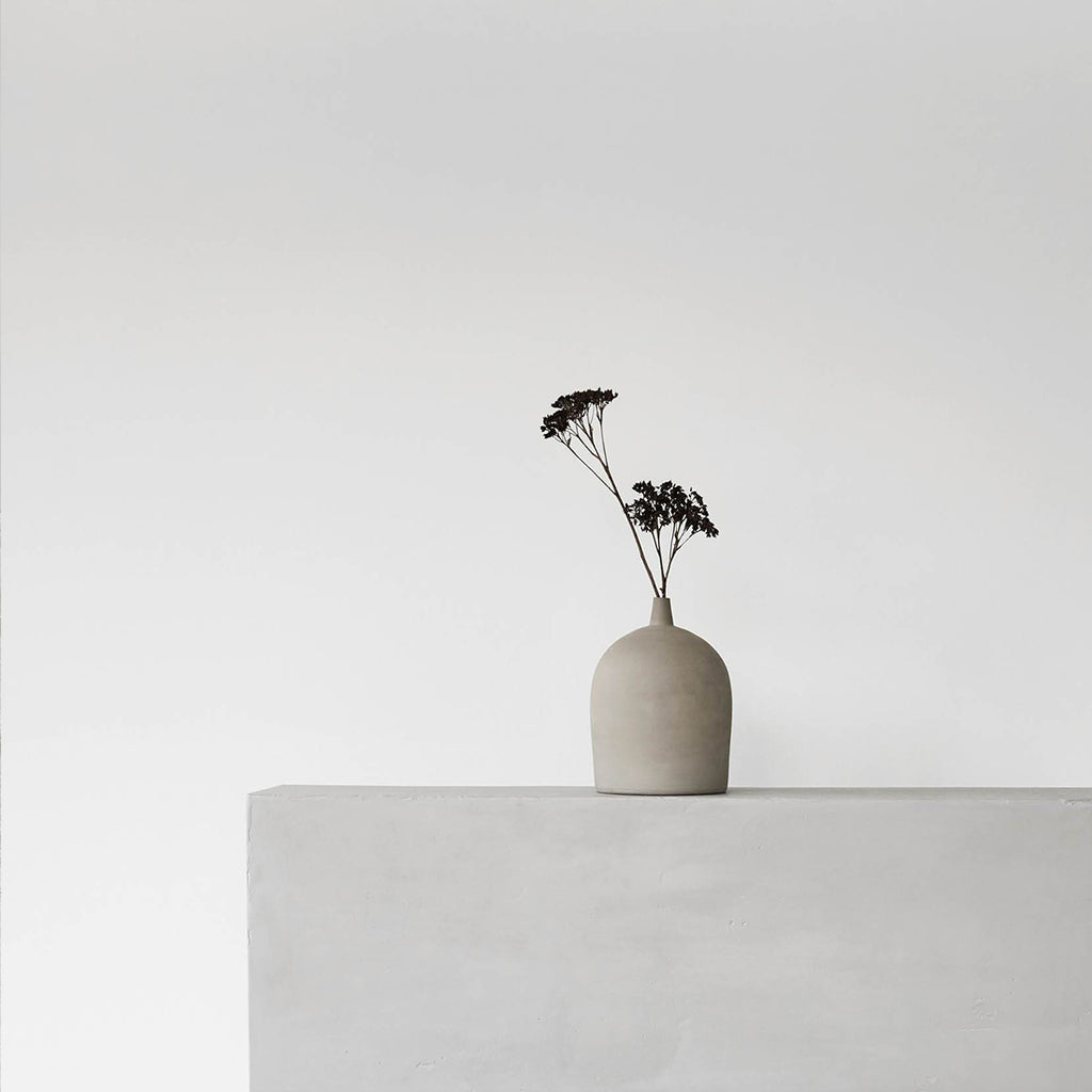 Minimalitic styles decorative vase with one flower